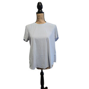Lululemon light blue tulip layered back top with detailing at the bottom, size 6